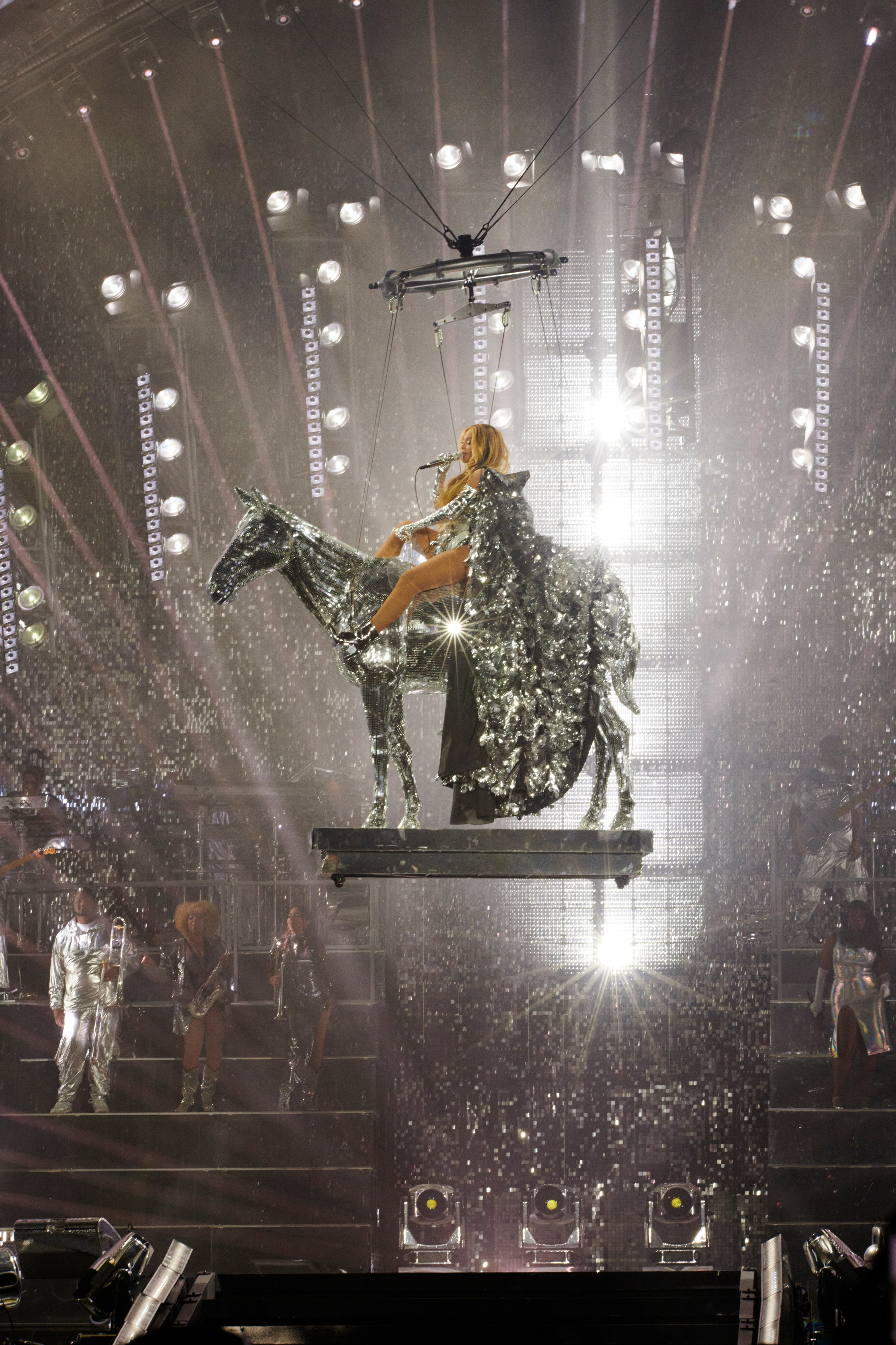 Beyonce flying above Renaissance World Tour stage on metallic horse