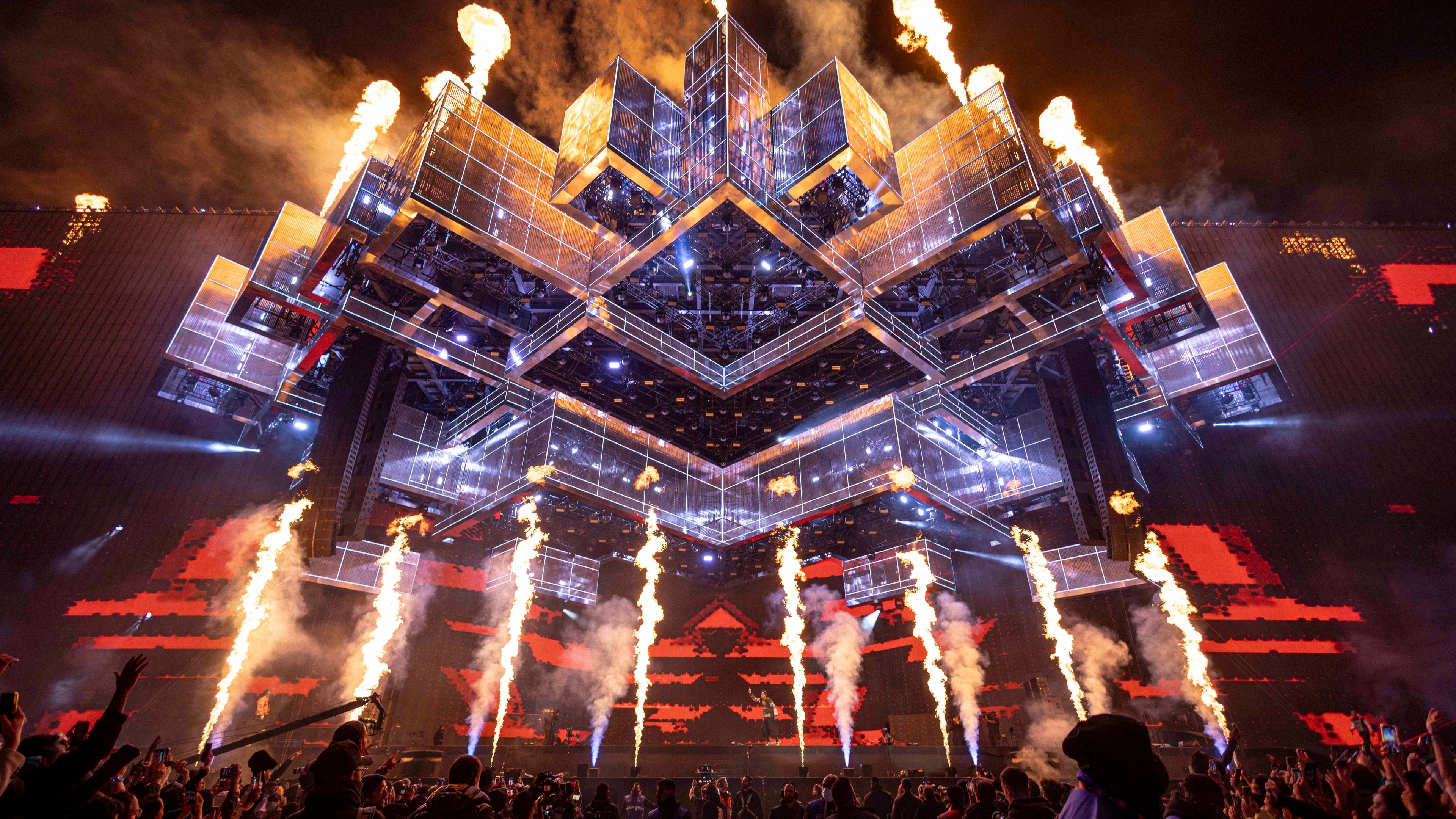 landscape image of soundstorm festival at night with a variety of colorful lights