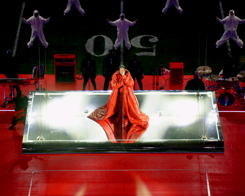 top down view of Rihanna performing on a floating stage