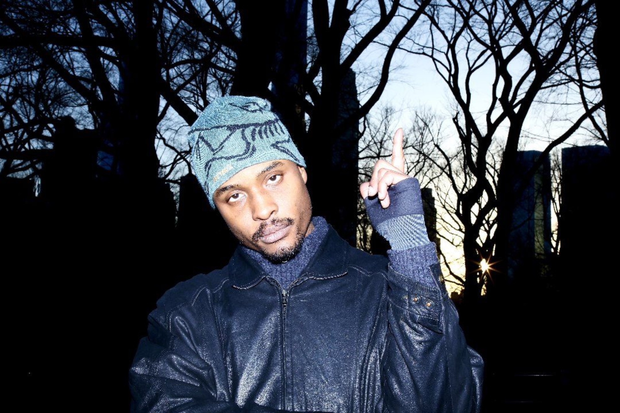 Artist, Nourished By Time, in a city park