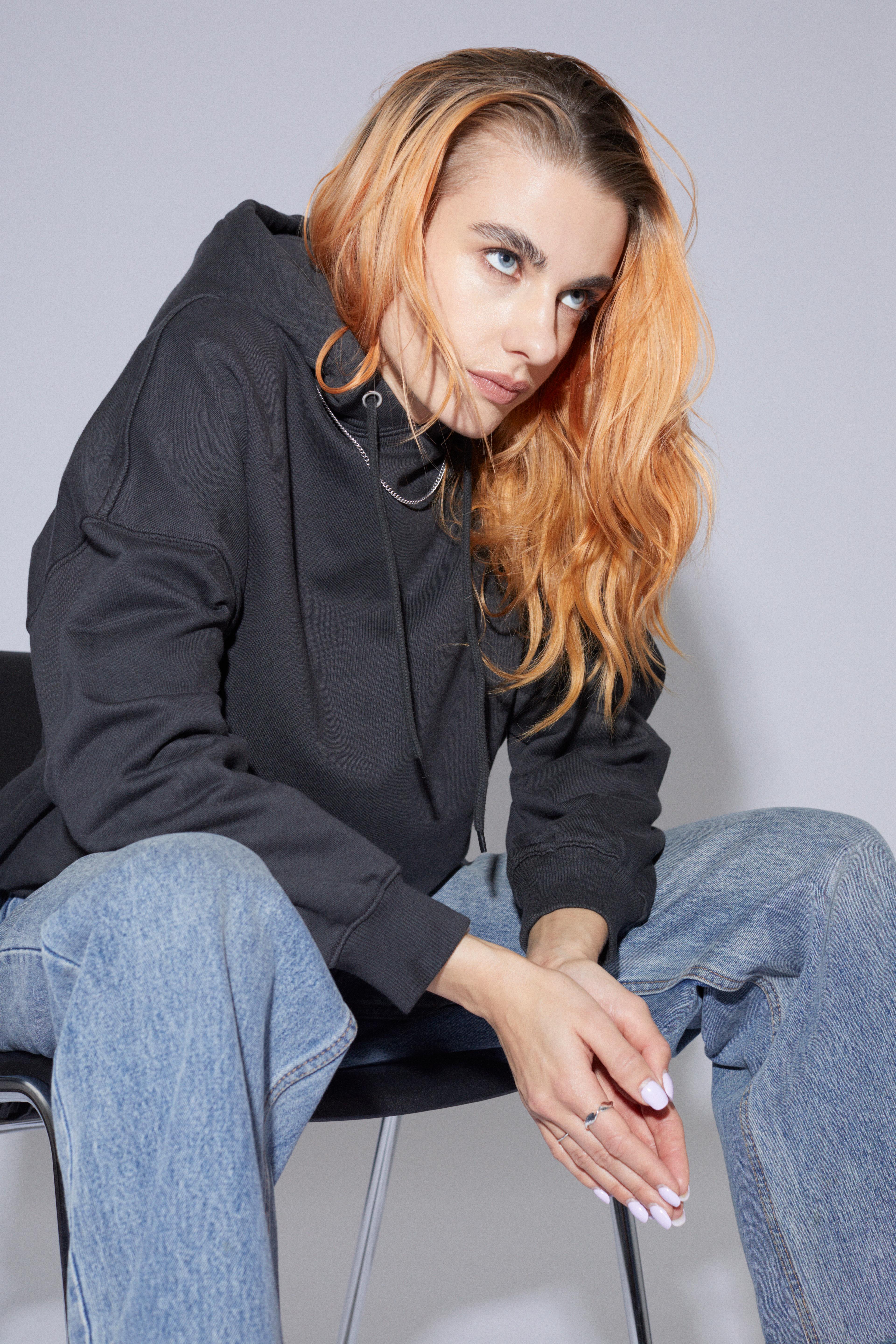 Contemporary collection, woman wearing our womens oversized hoodie