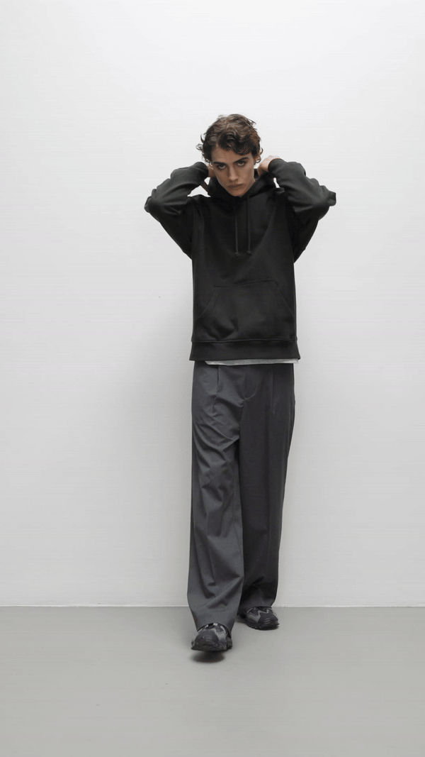 Contemporary collection, man wearing True Blanks mens boxy hoodie