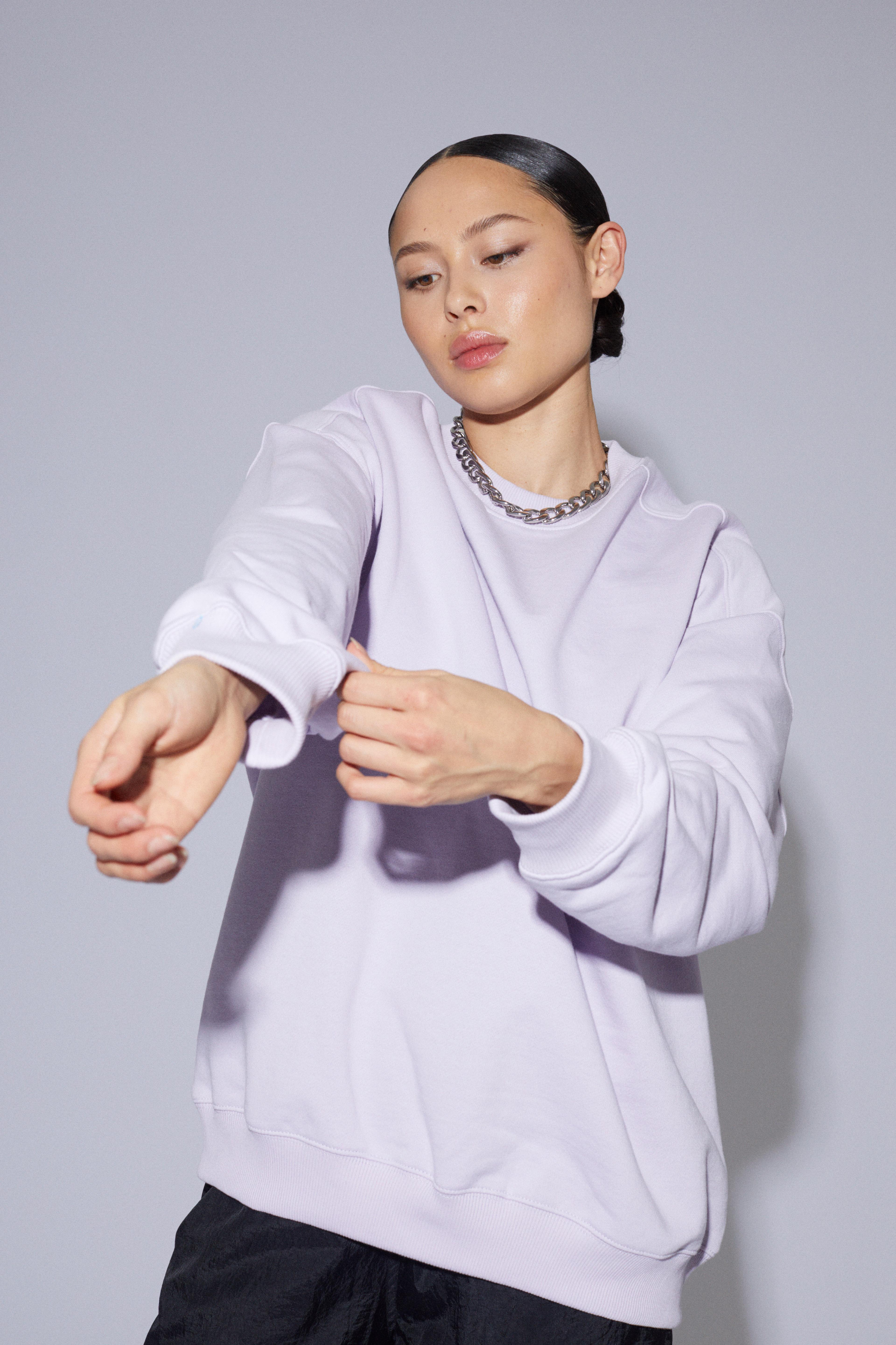 Contemporary collection, woman wearing our womens oversized sweatshirt
