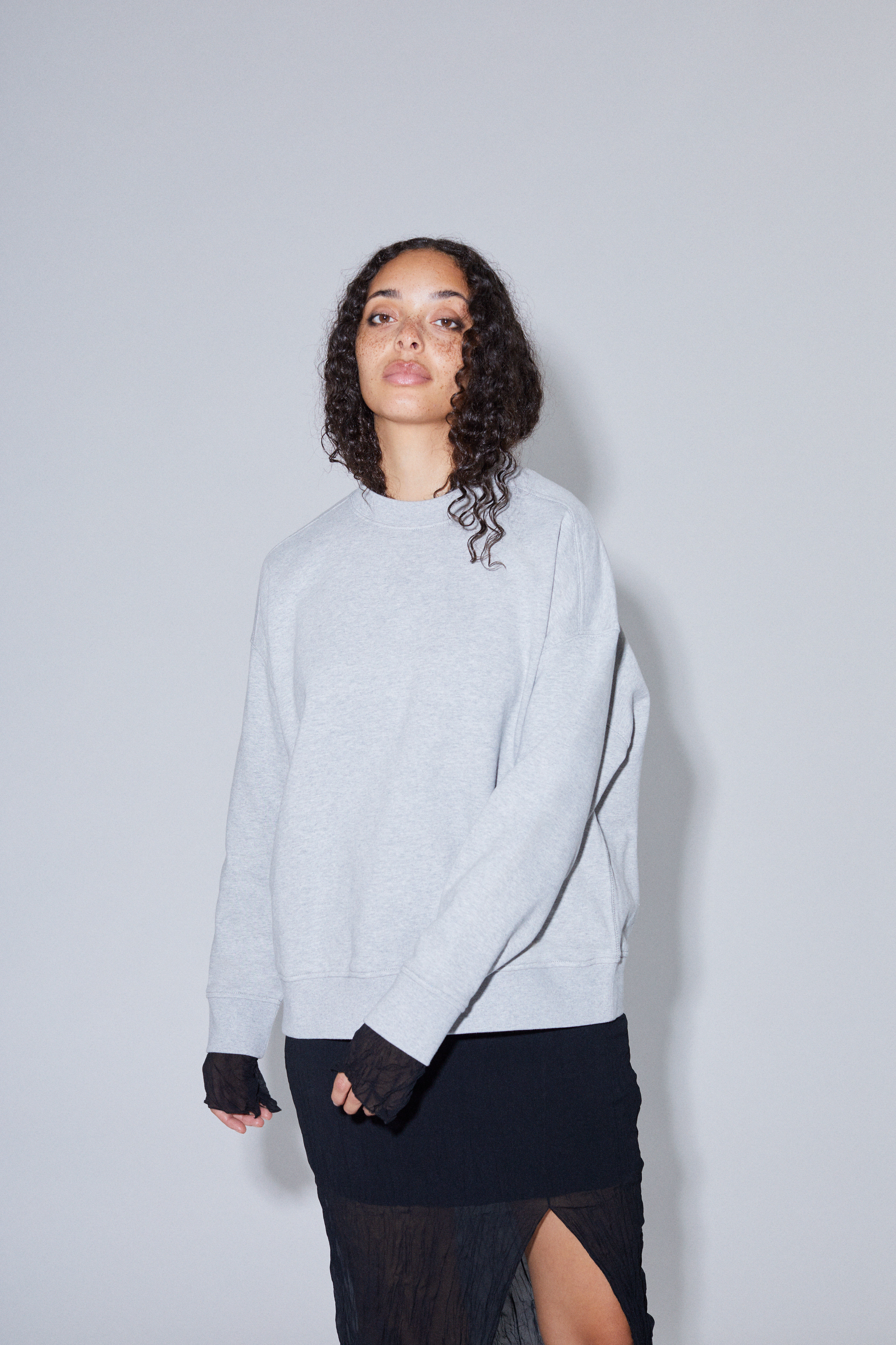 Contemporary collection, woman wearing True Blanks womens oversized sweatshirt
