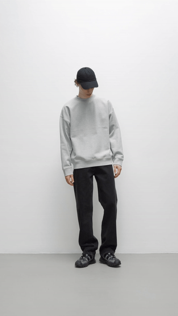 Contemporary collection, man wearing True Blanks mens boxy sweatshirt