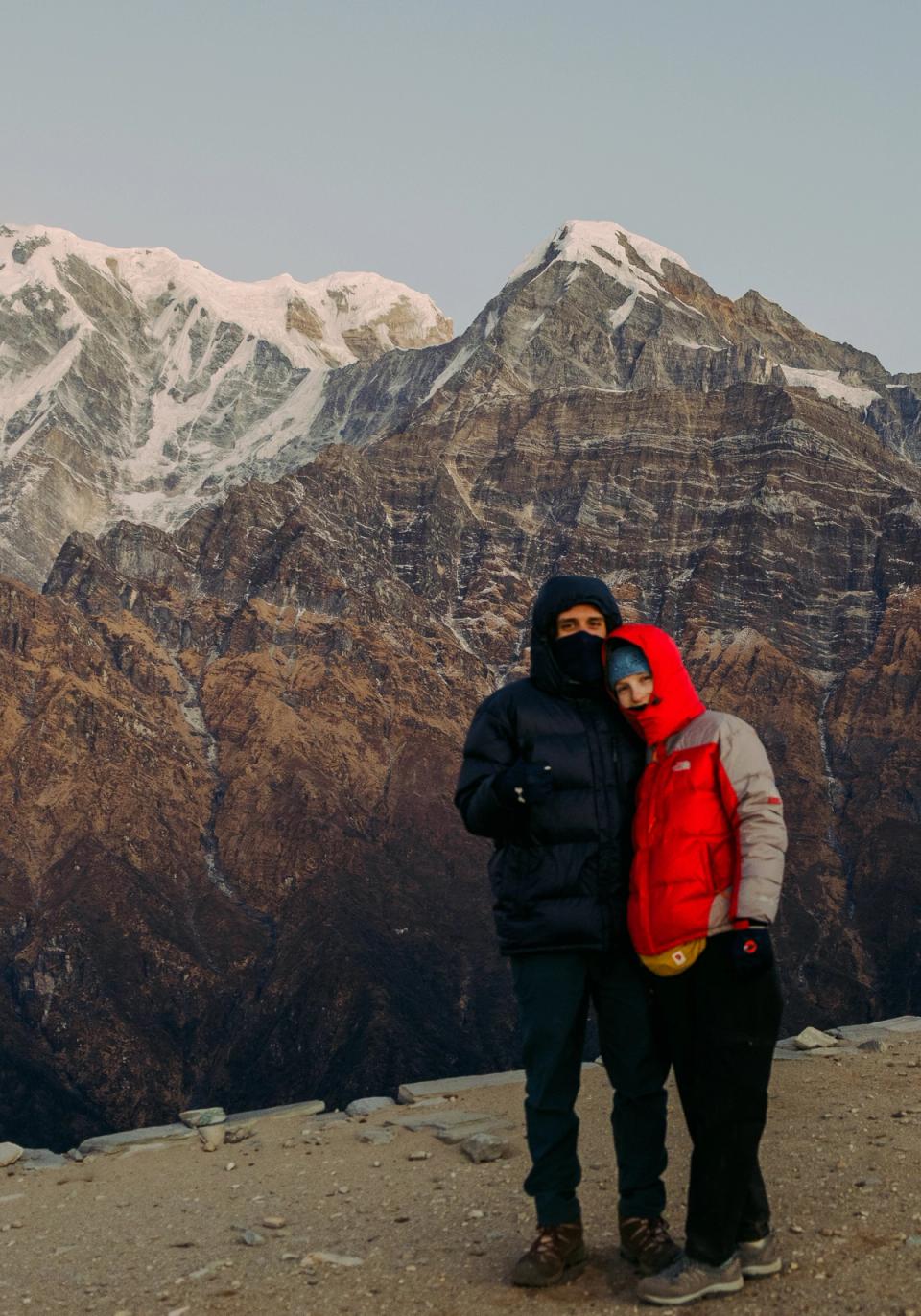 Image of two people on the mountains