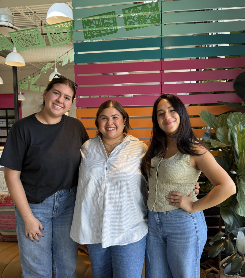 Team members posing for pictures