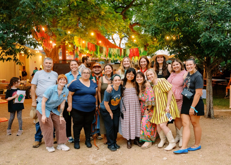 Team members posing for pictures