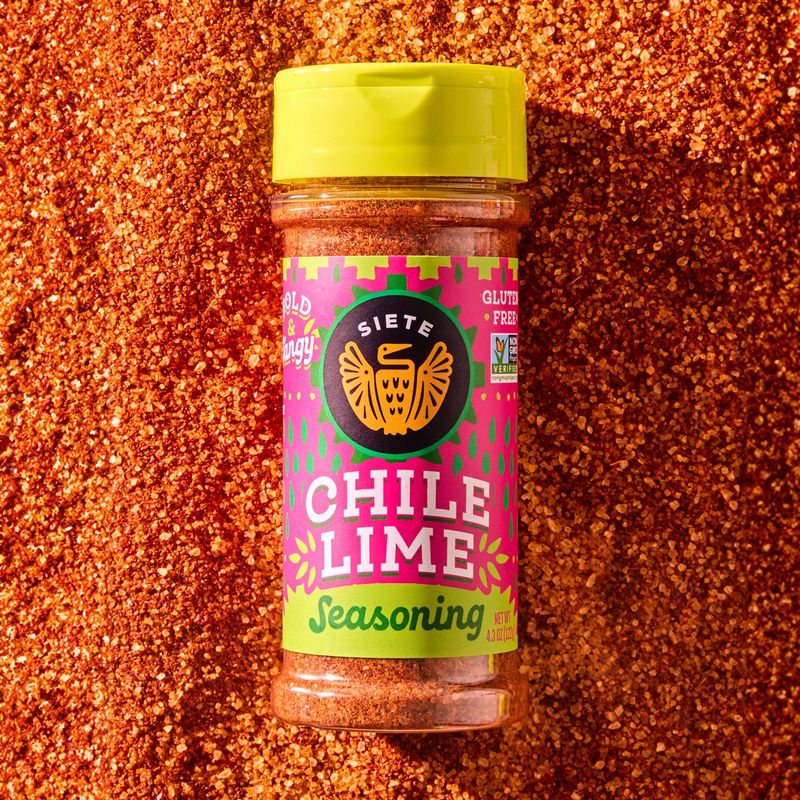 Bottle of Chile Lime Seasoning on a background of seasoning