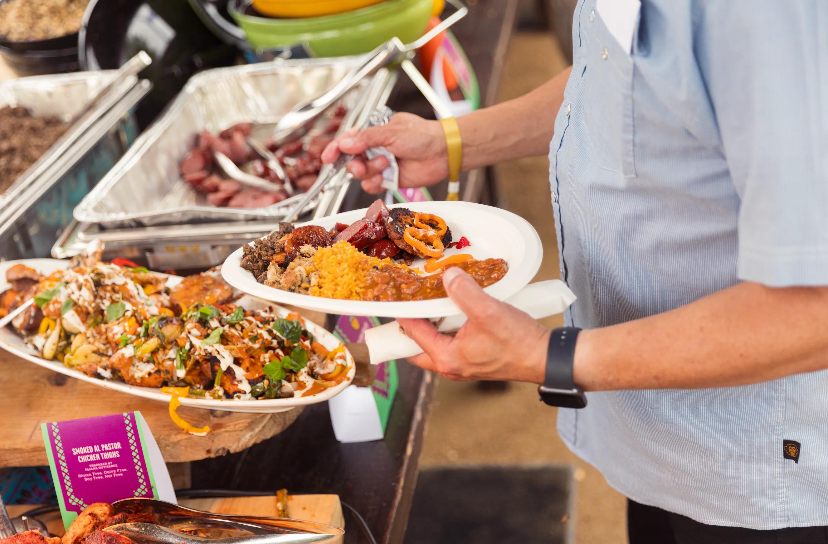 Loading up the plate at a backyard asada
