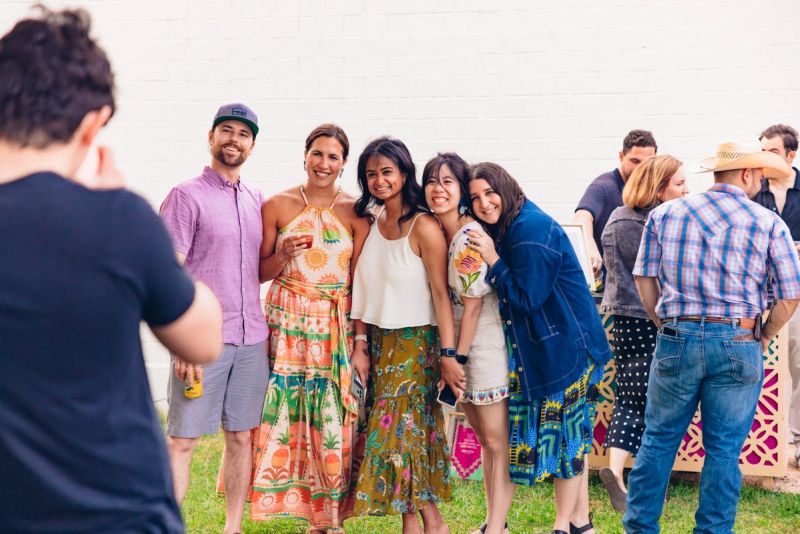 Team members posing for pictures