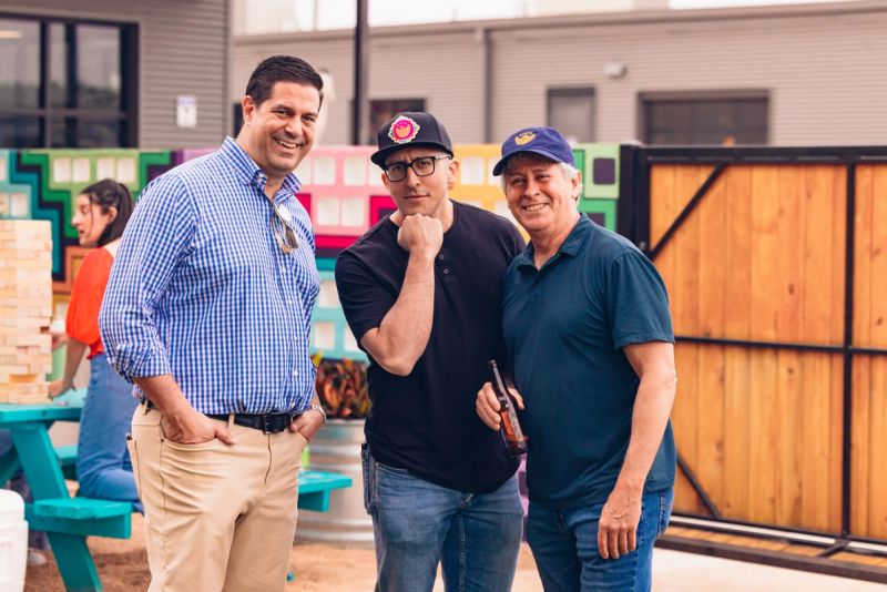 Team members posing for pictures