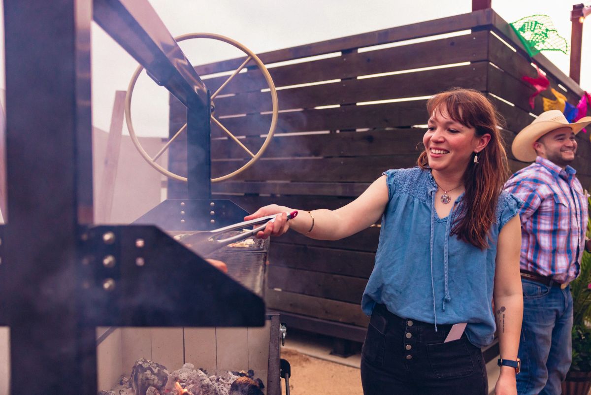 Grilling at a backyard asada