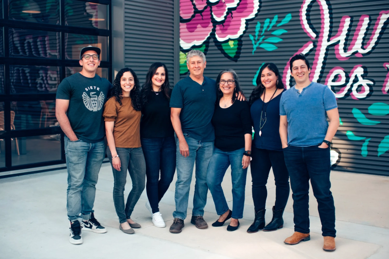 The Garza family posing for a photo together.