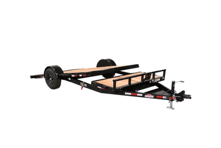 Studio product shot of a black single-axle tilt-deck utility trailer with the bed angled down, on a white background