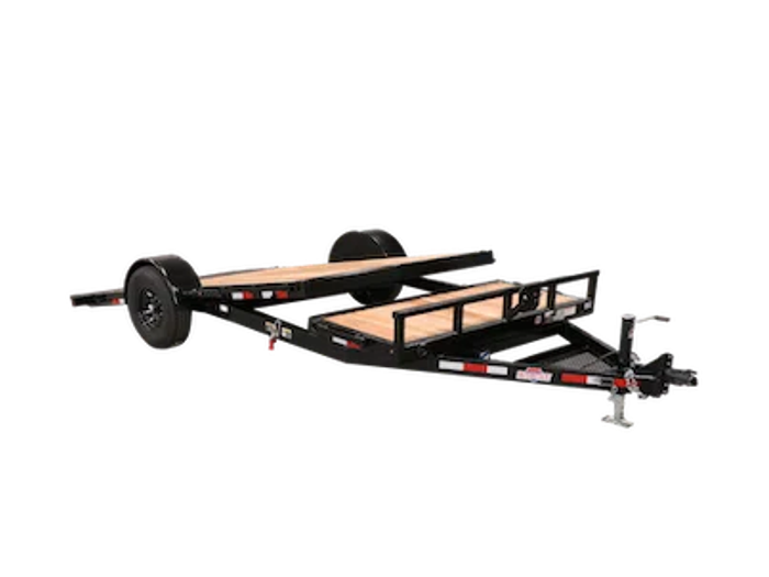 Studio product shot of a black single-axle tilt-deck utility trailer with the bed angled down, on a white background