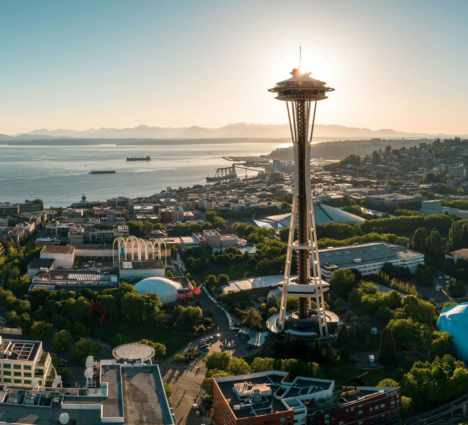 Seattle’s Space Needle overlooking the city and Puget Sound at sunset