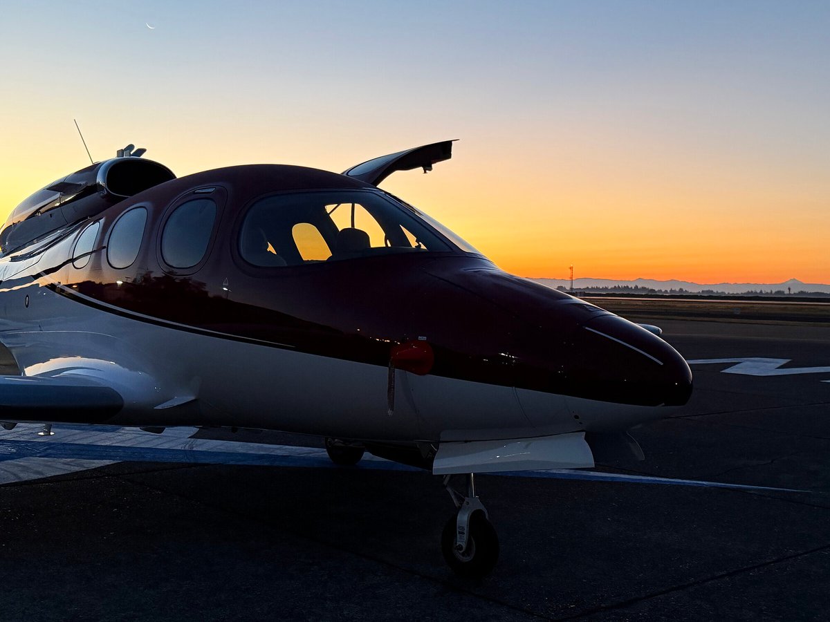 Cirrus Vision Jet on the ramp at McMinnville before sunrise