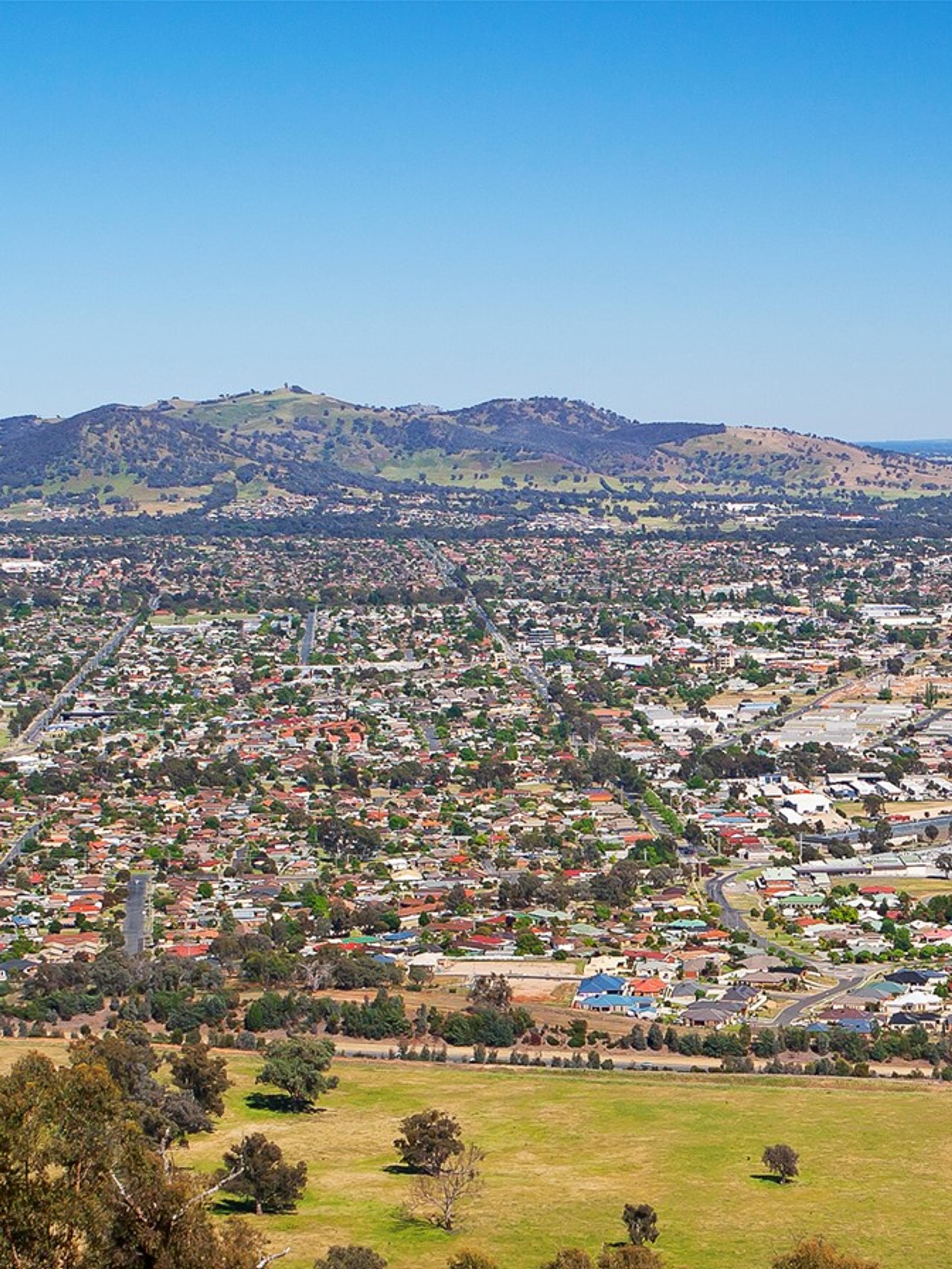 Aerial view over Wodonga with hills in the distance