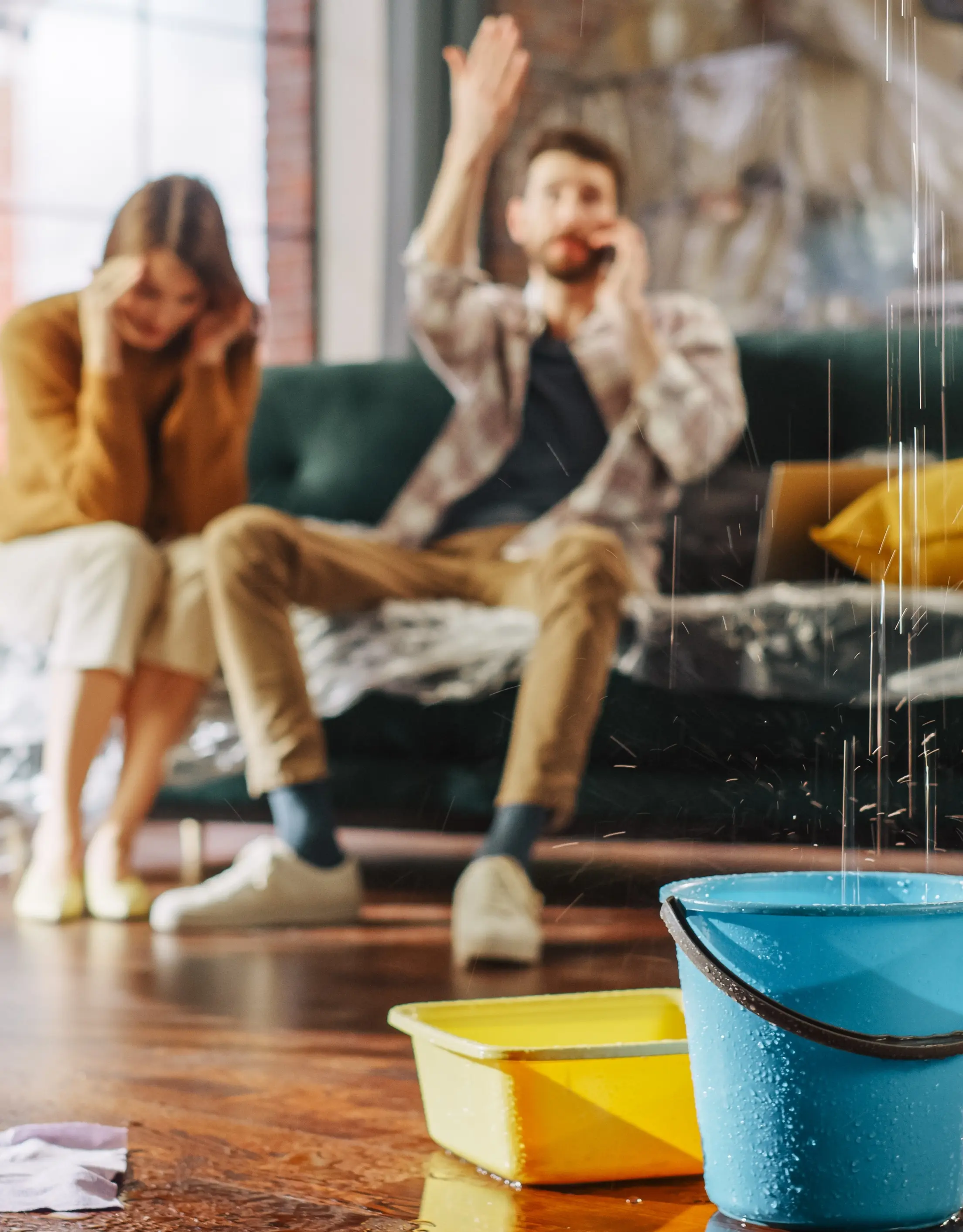 Couple upset with a water leak in their living room