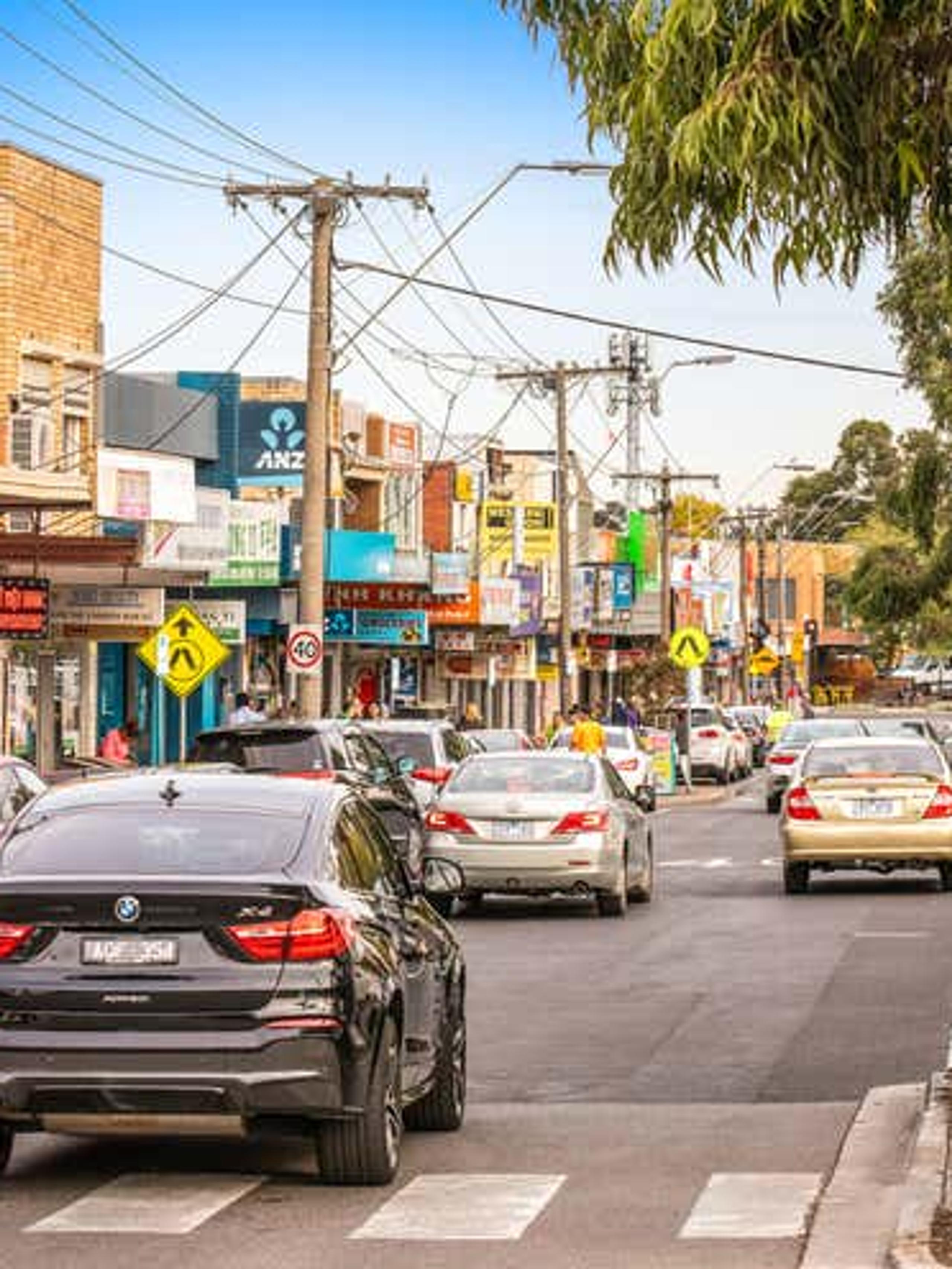St Albans street with cars and shops