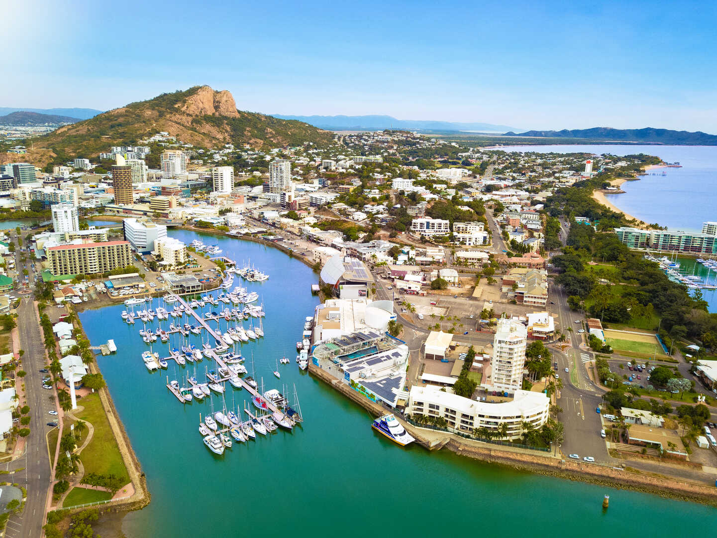 Bright aerial view of waterfront and boat dock