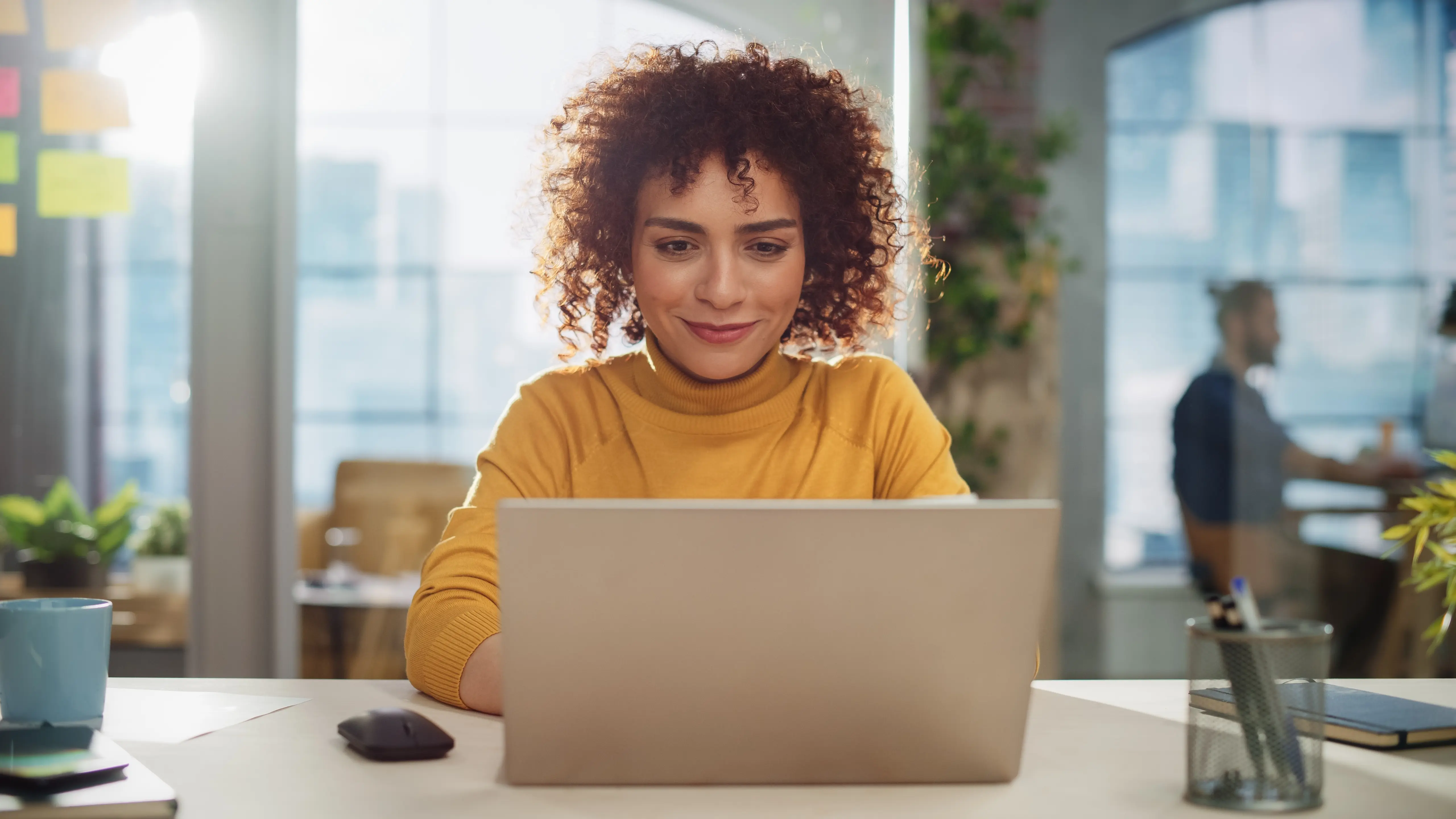 Young attractive woman working on her laptop