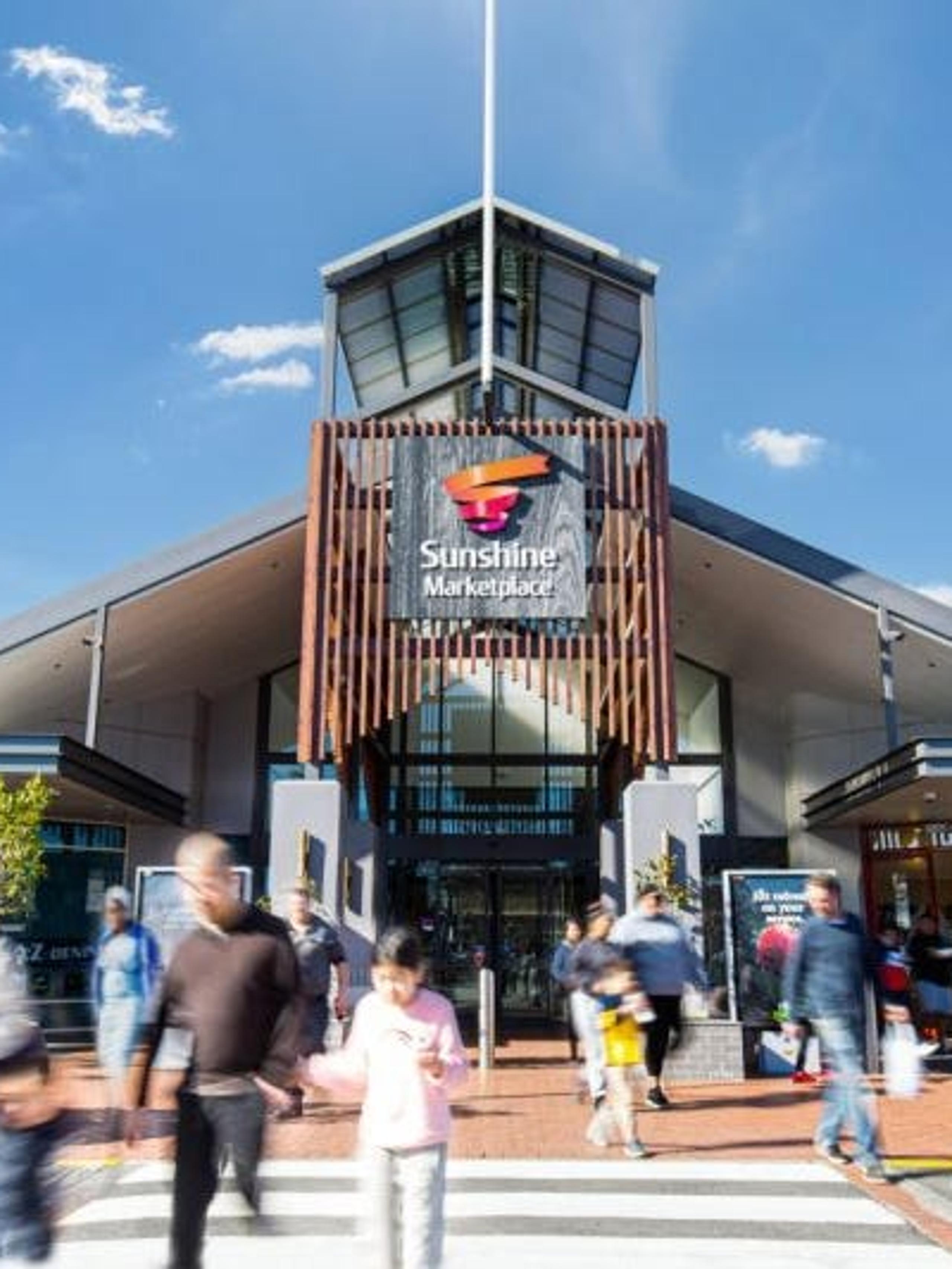 Outside the entrance to Sunshine Marketplace shopping center