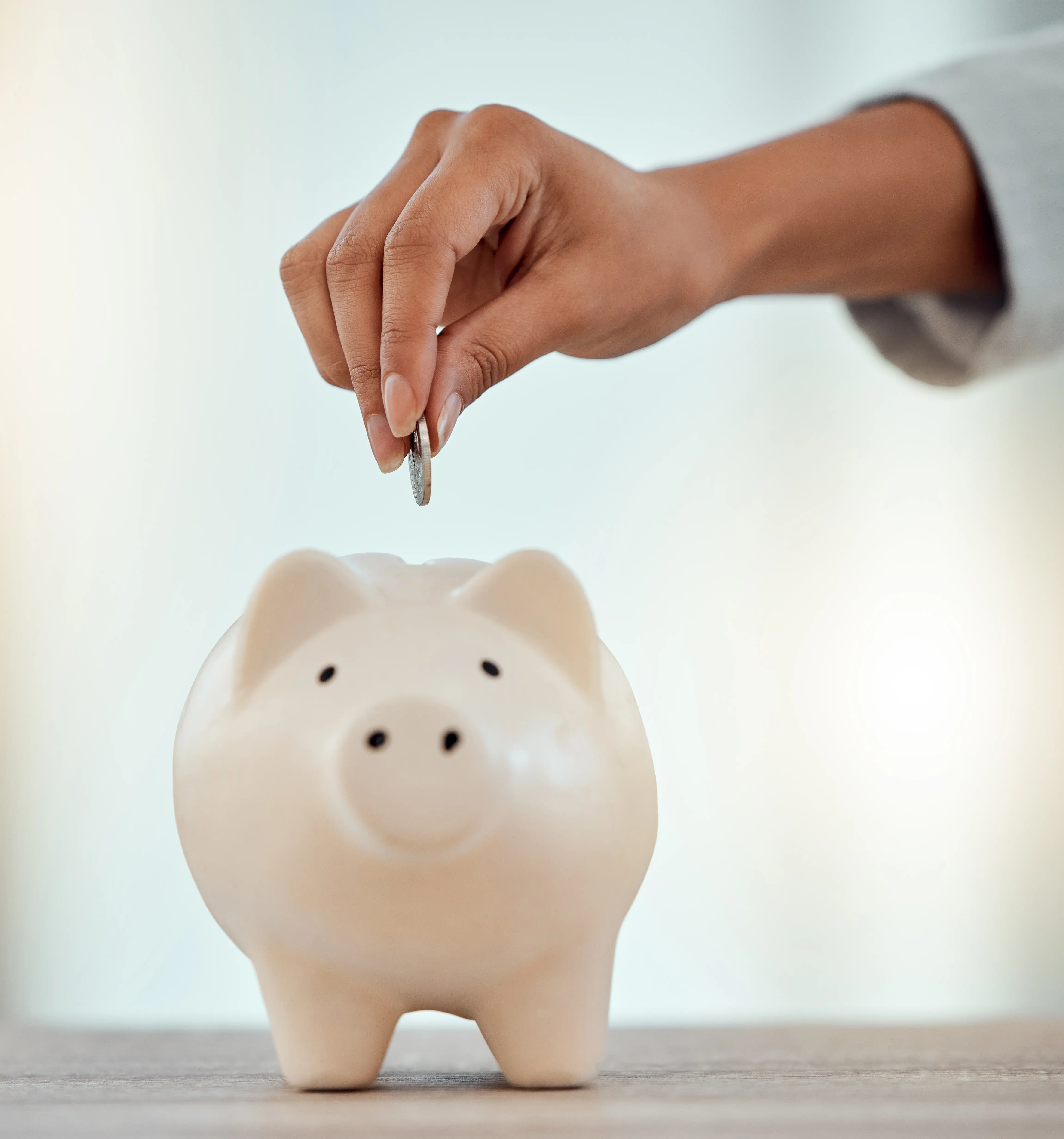 Cream coloured piggy bank