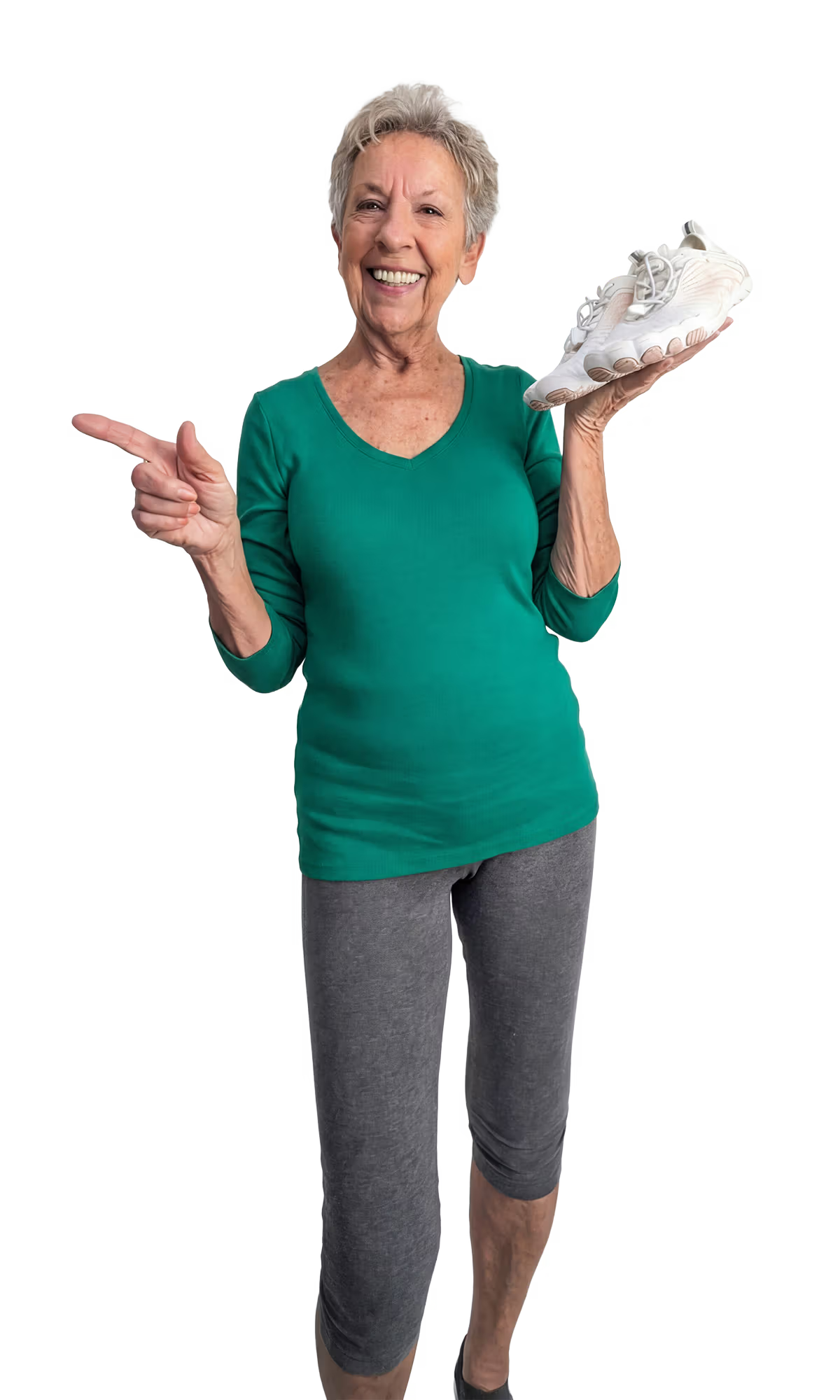 Annie P. holding a pair of Pluma barefoot shoes