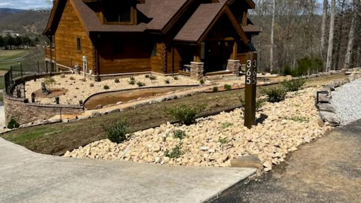 Wooden Modern home with landscaping and hardscaping