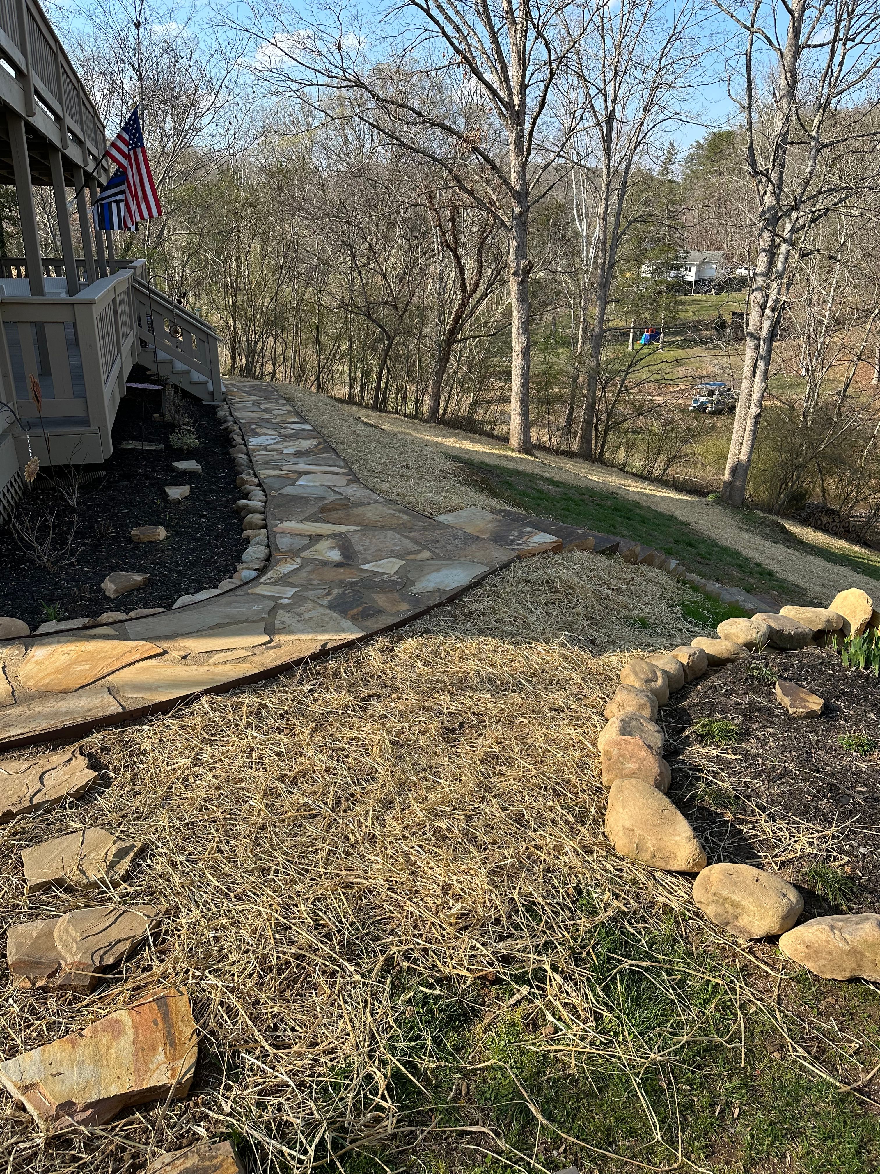 Graded yard to ensure water flows away from foundation of home