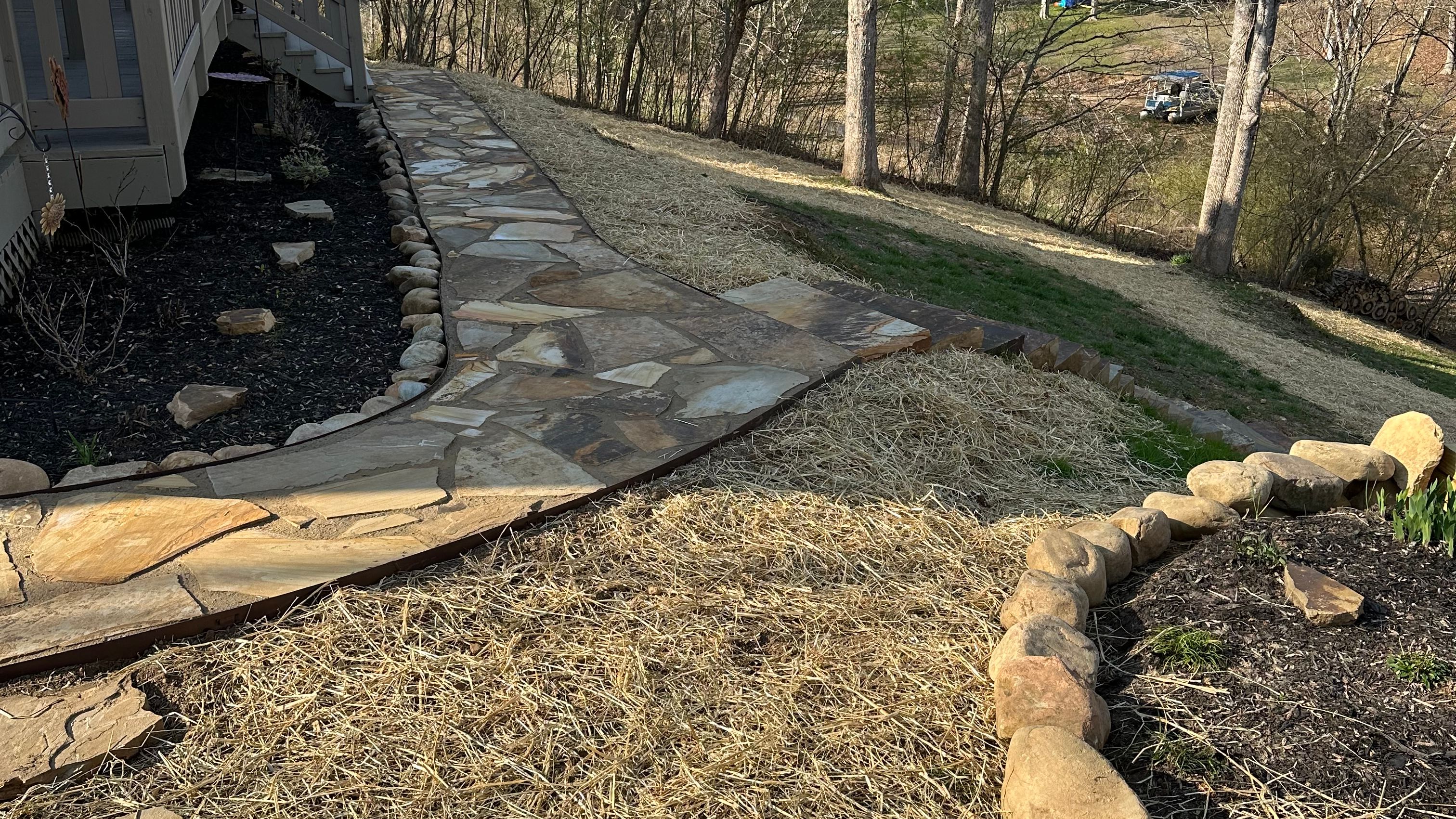 Graded yard to ensure water flows away from foundation of home