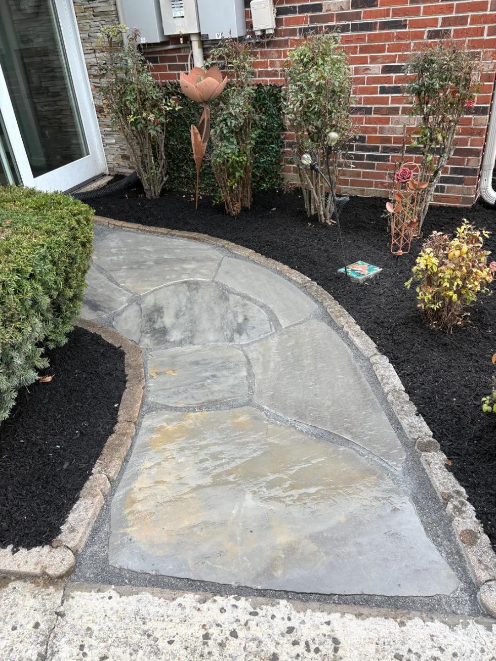 Walkway surrounded by mulch