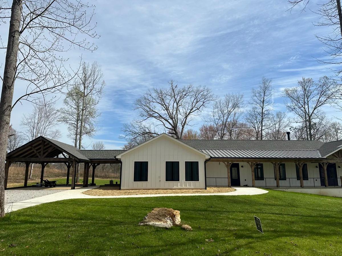 Home with a nicely cut and green lawn