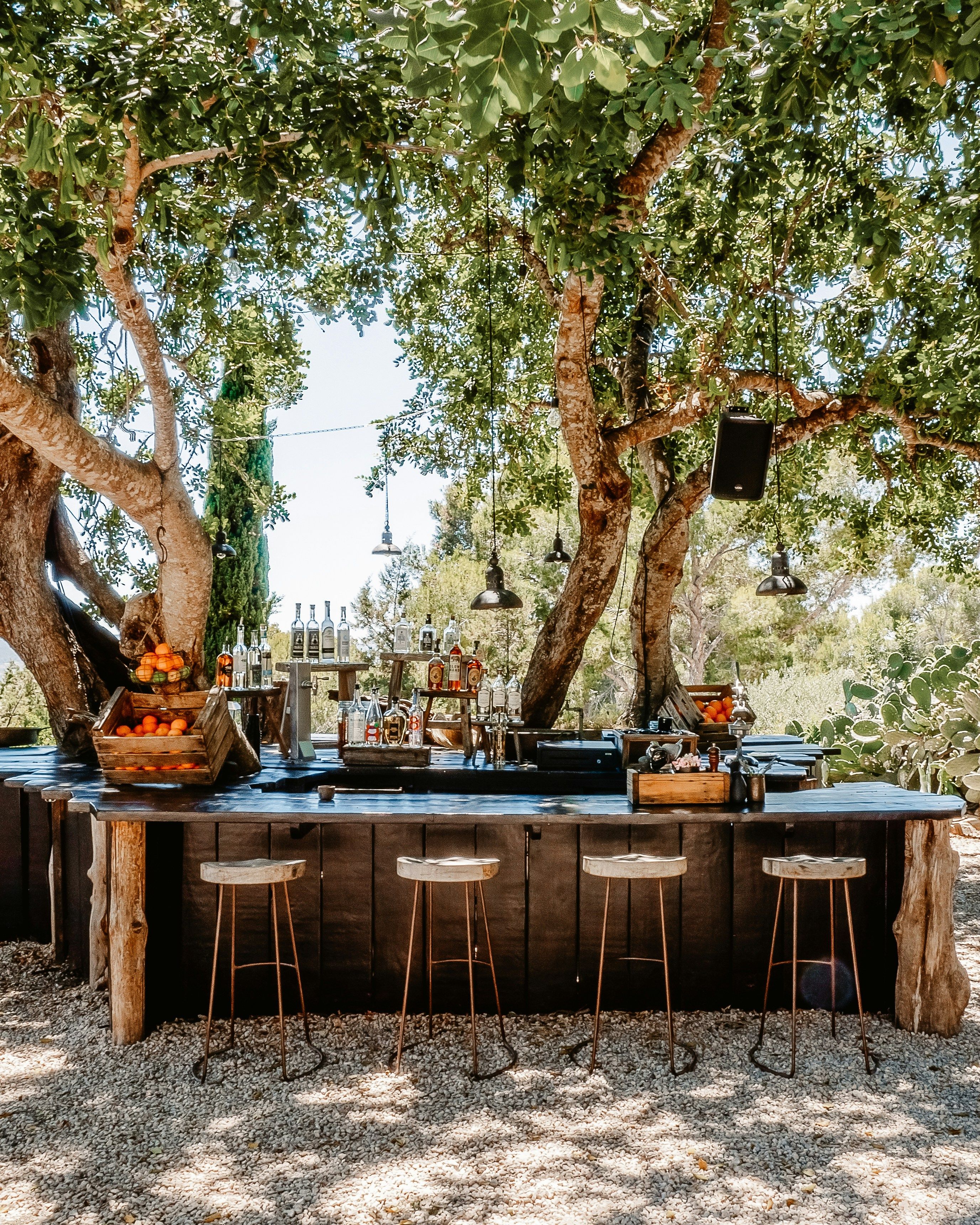 outdoor kitchen with barstool chairs