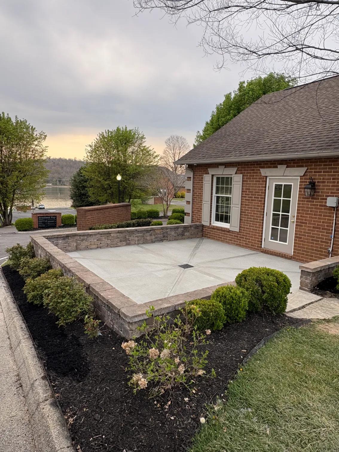 Newly done patio surrounded by plants