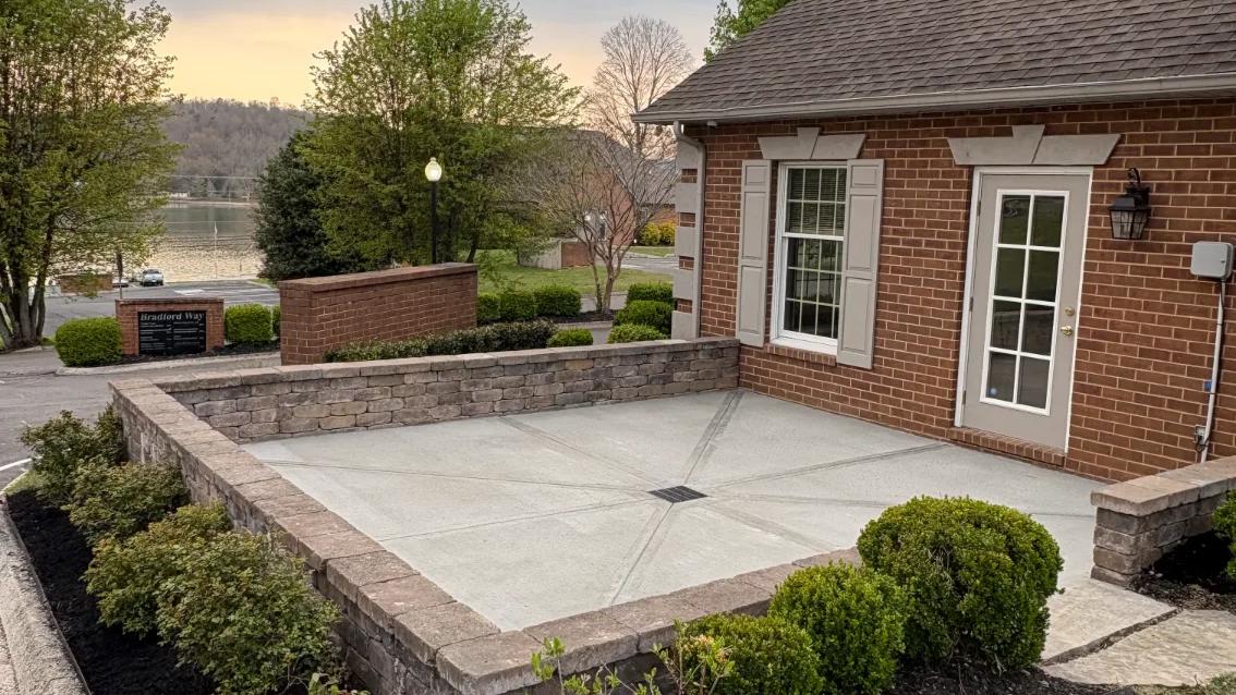 Newly done patio surrounded by plants