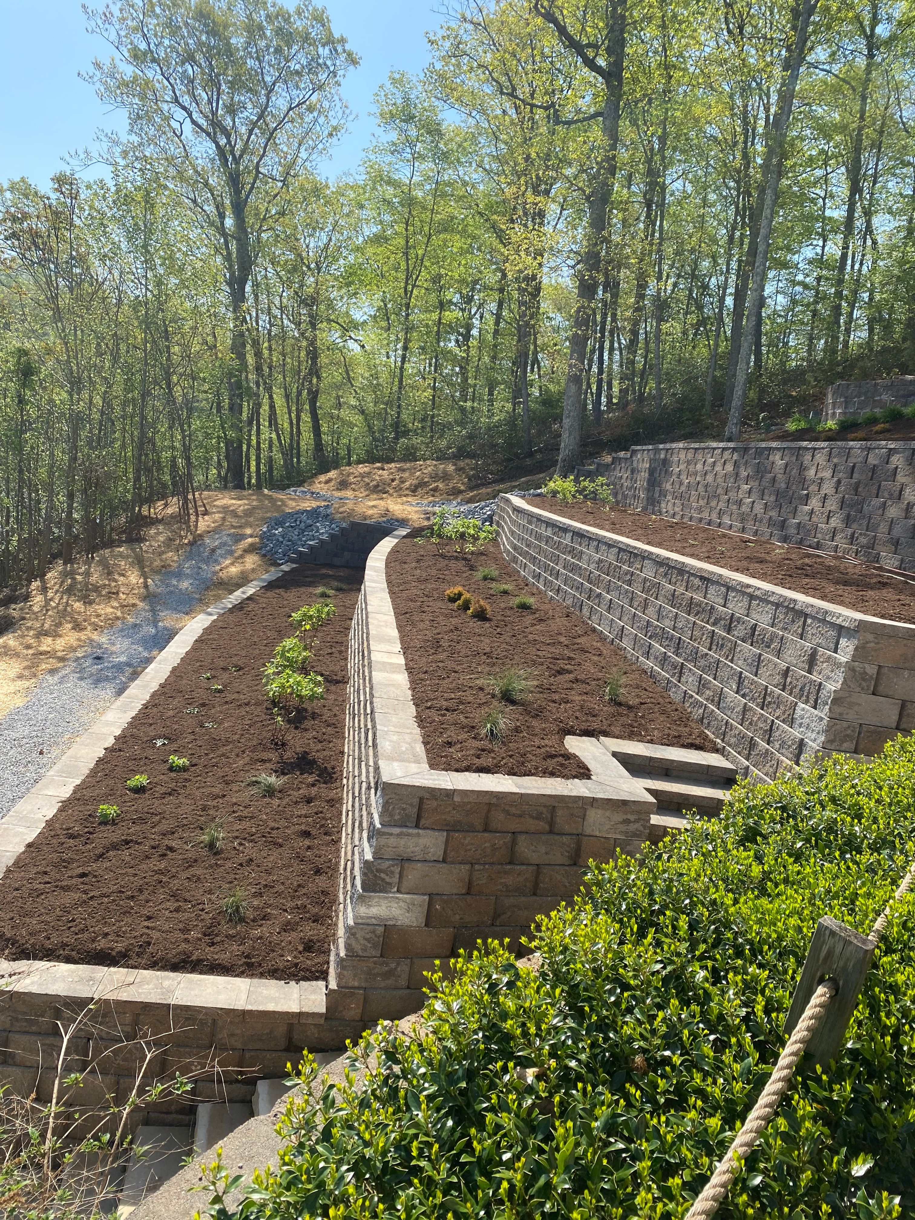 Multi layered retaining wall