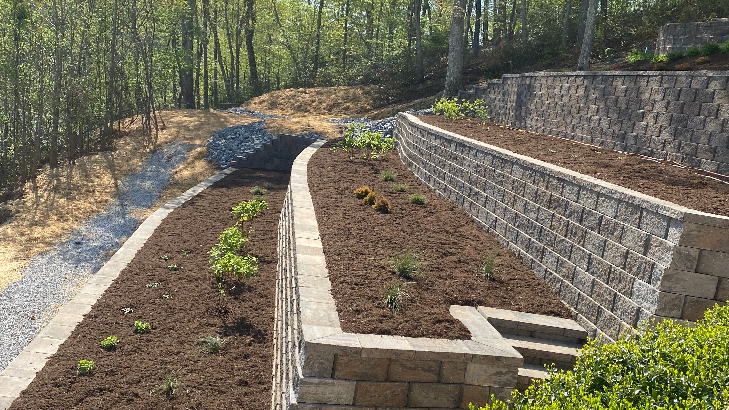 Multi layered retaining wall