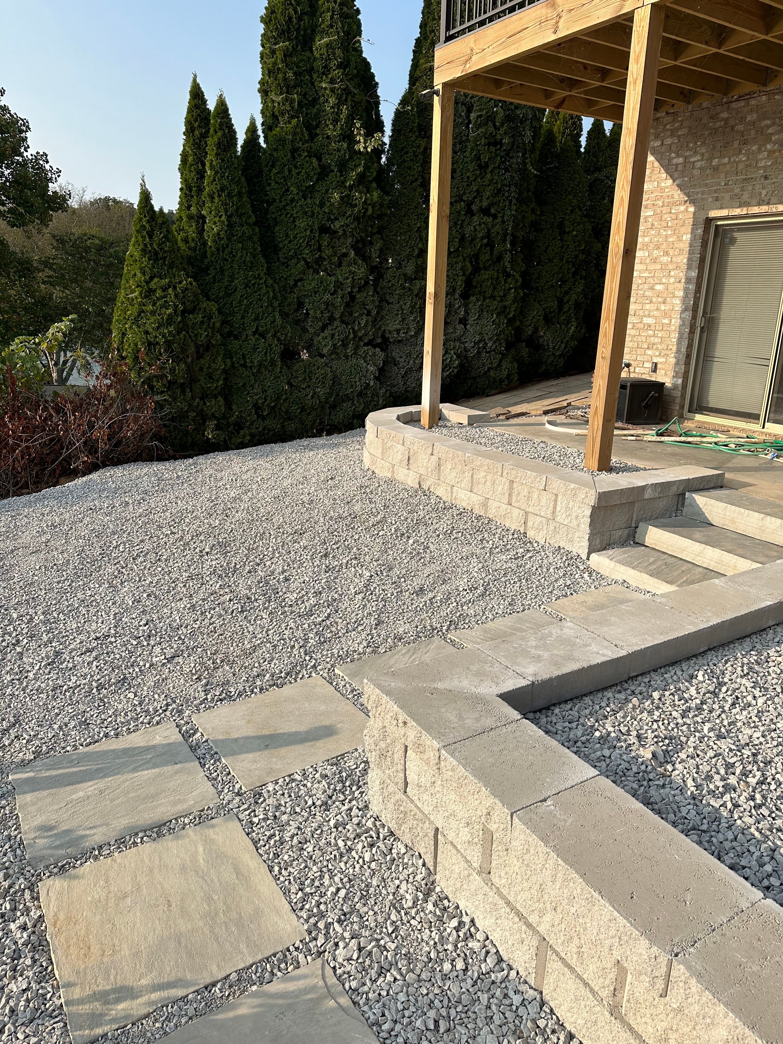 Newly installed retaining wall in backyard