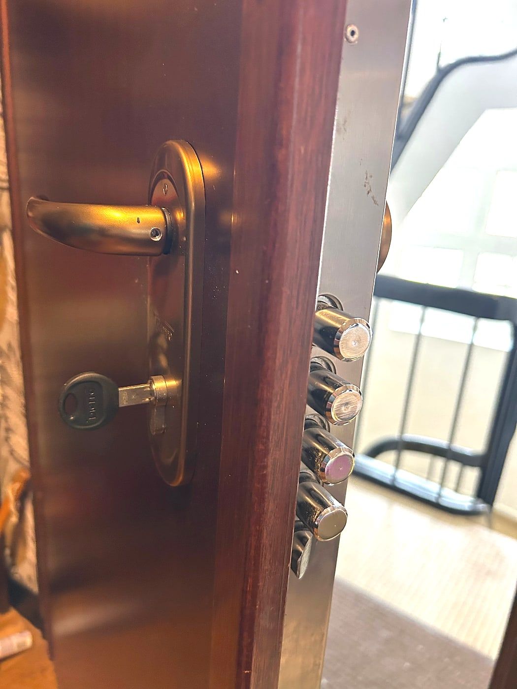 Gold lock on a wooden door