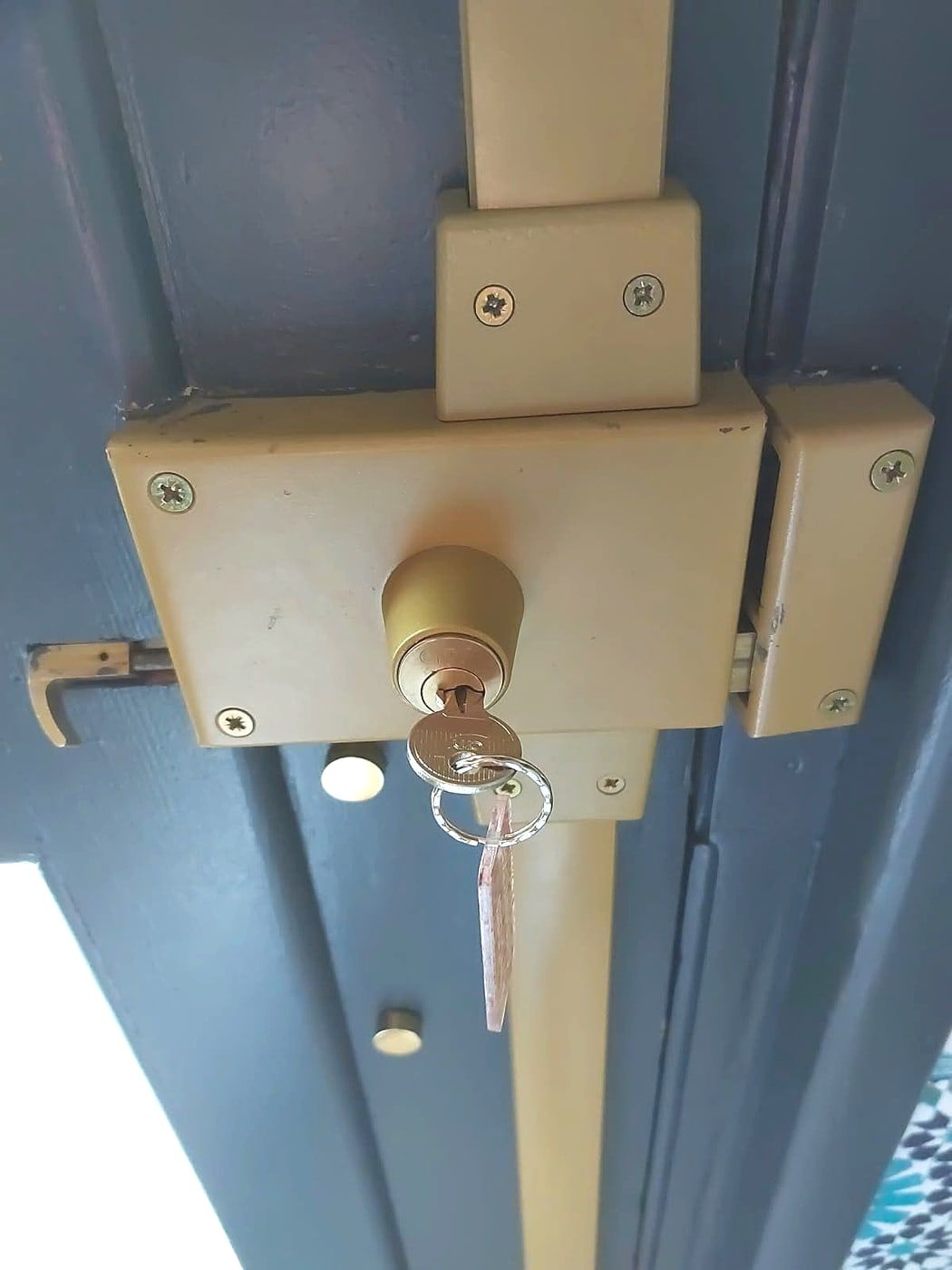 Lock and key on a metal door