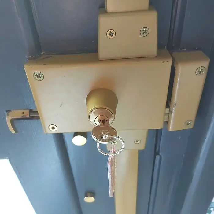 Lock and key on a metal door