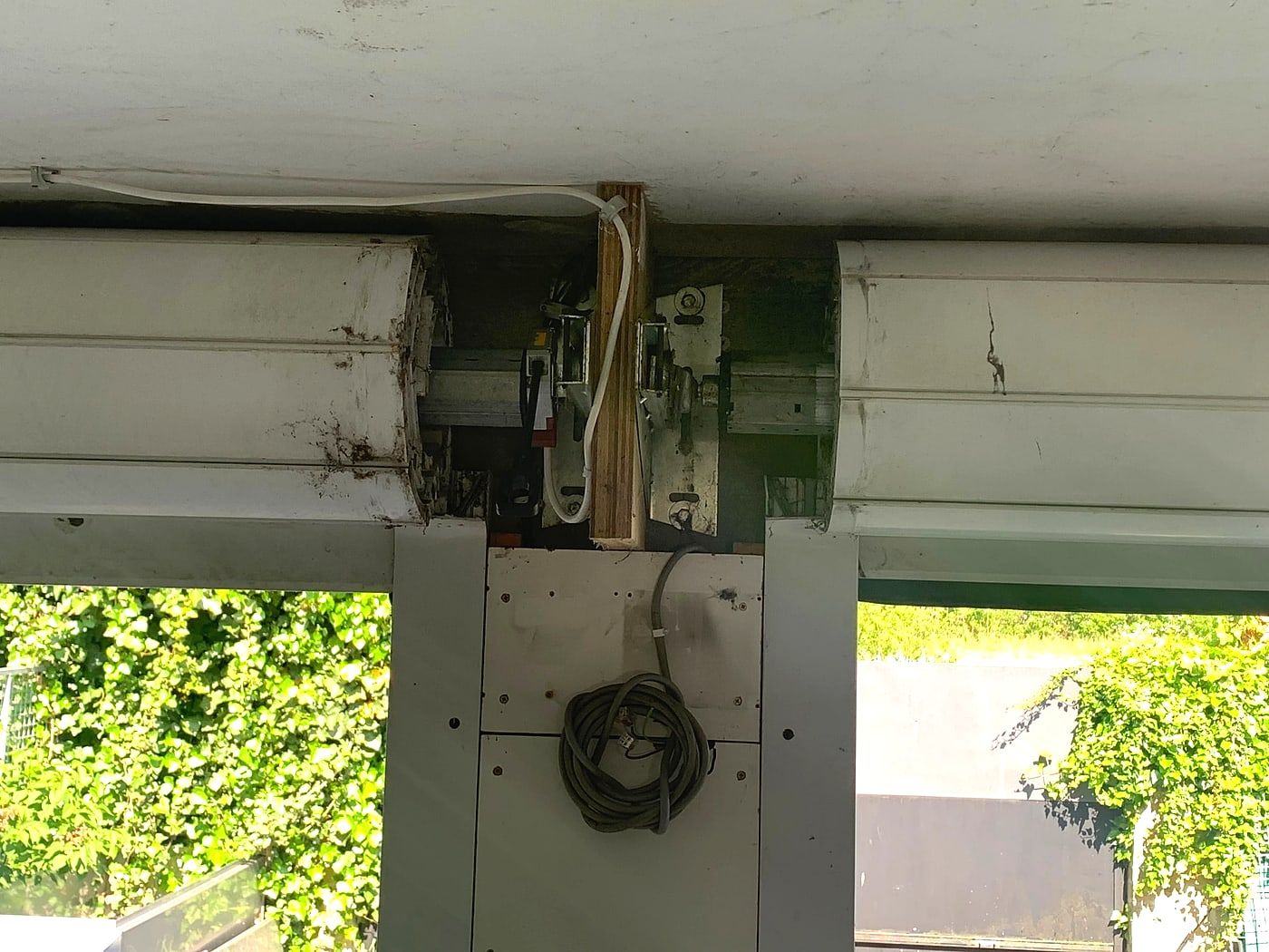 Roller shutter box opened, mechanism visible