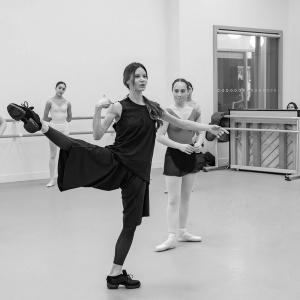 Dancers receiving instruction