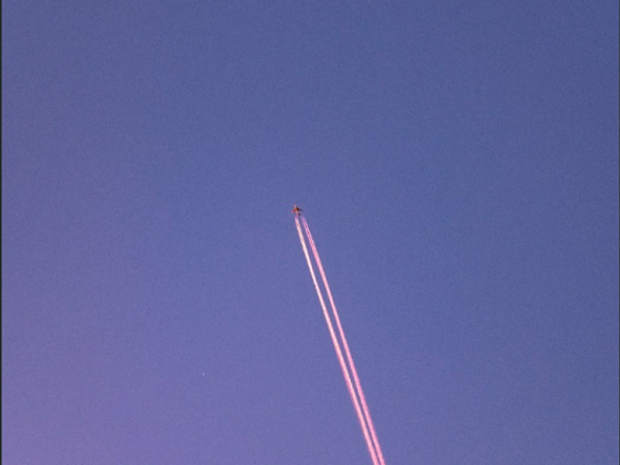 plane in a beautiful blue sky