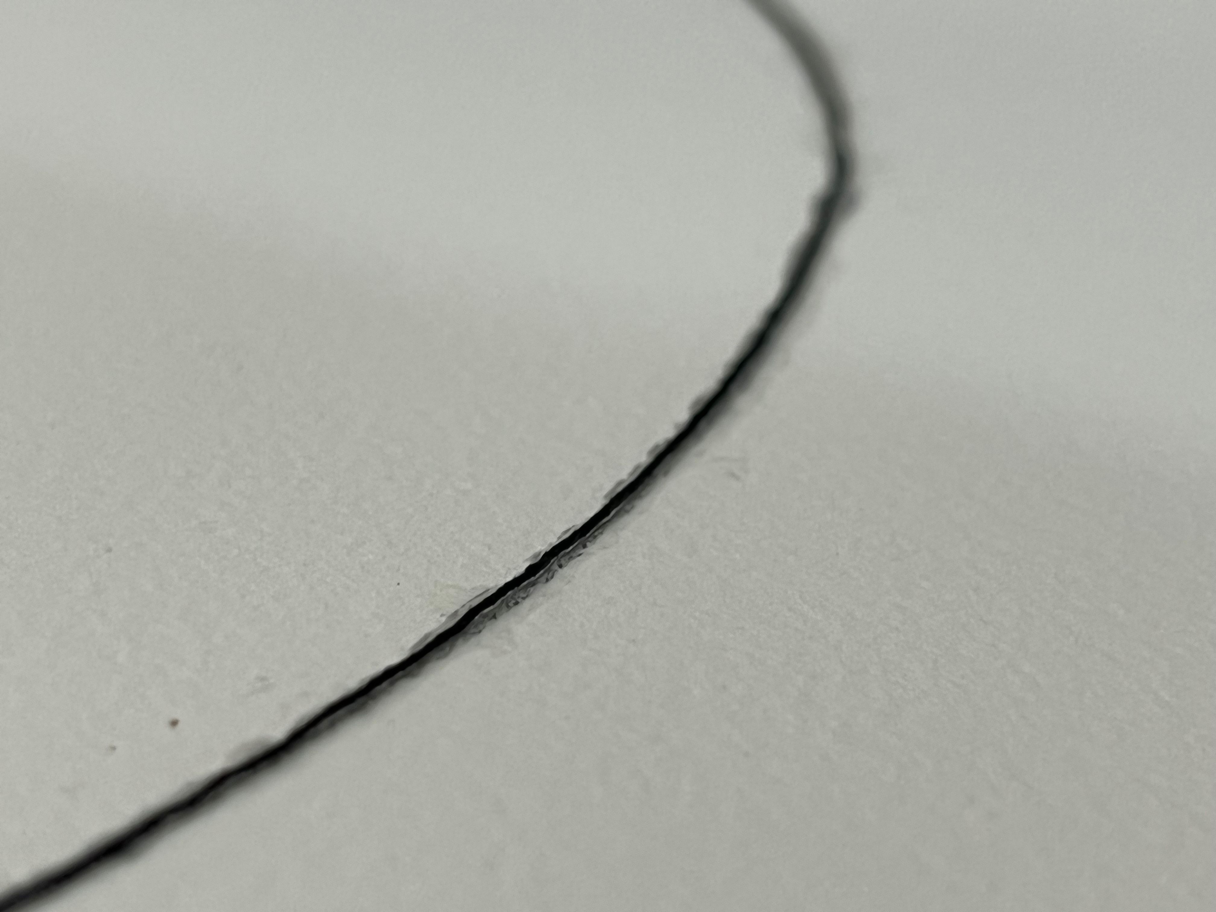 Close up of a string on paper
