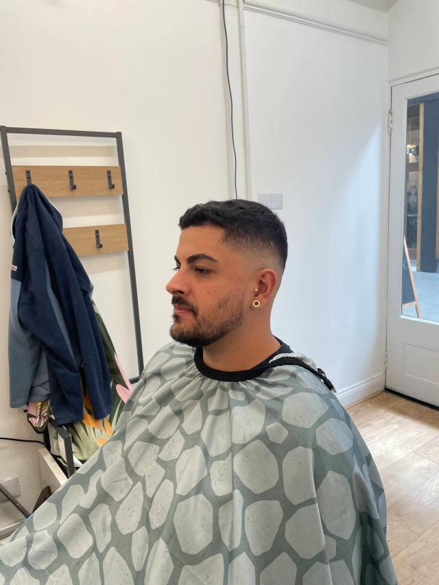 Short crop with a skin fade and tidy beard
