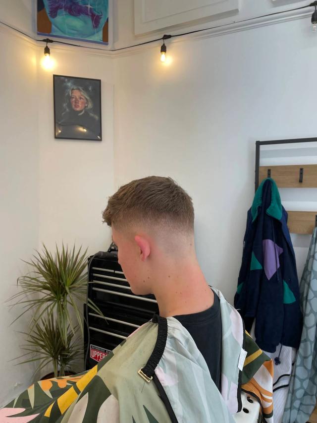 Choppy textured crop with a high skin fade